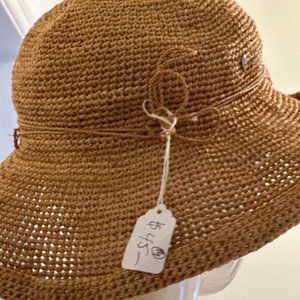 Helen Kaminski summer hat.   Feels like a small/medium.  Color in photos